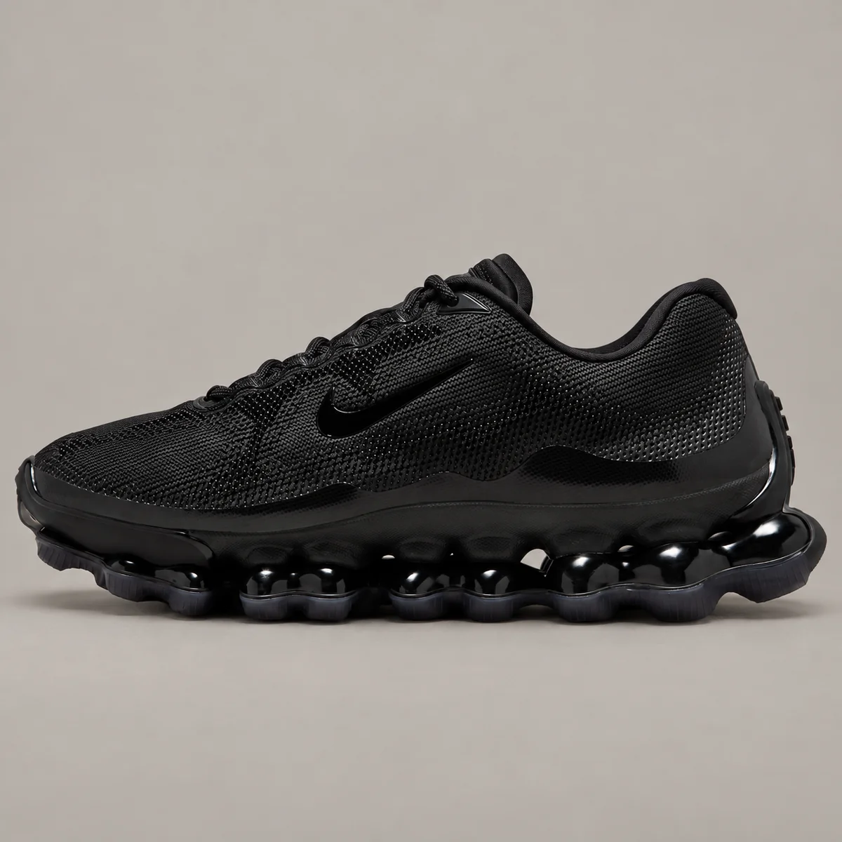 Nike Air Liquid Max — warm stone-gray studio cover