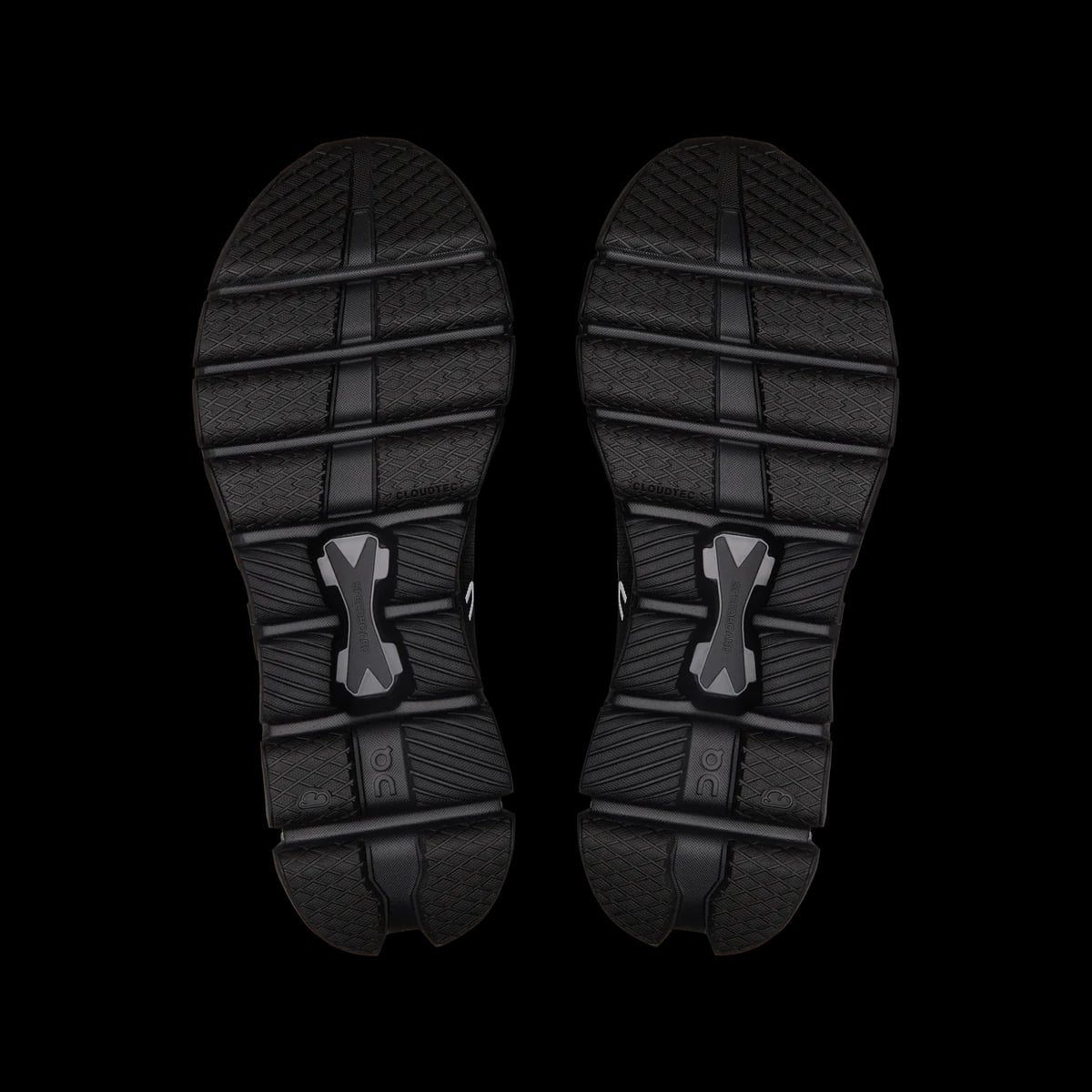 On Cloud X 4 — black / eclipse — outsole view (official reference photograph)