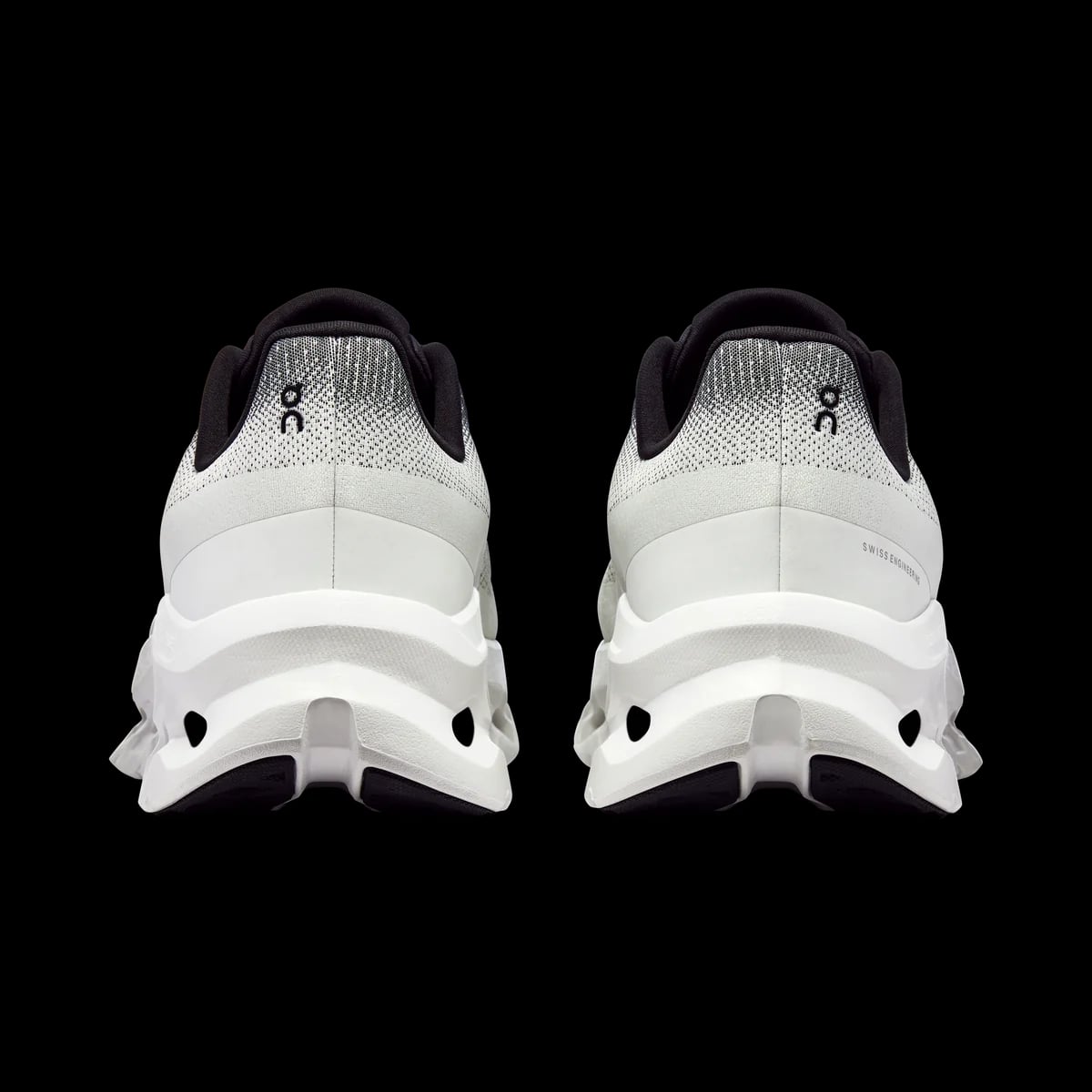 On Cloudtilt — black / ivory — rear view (official reference photograph)