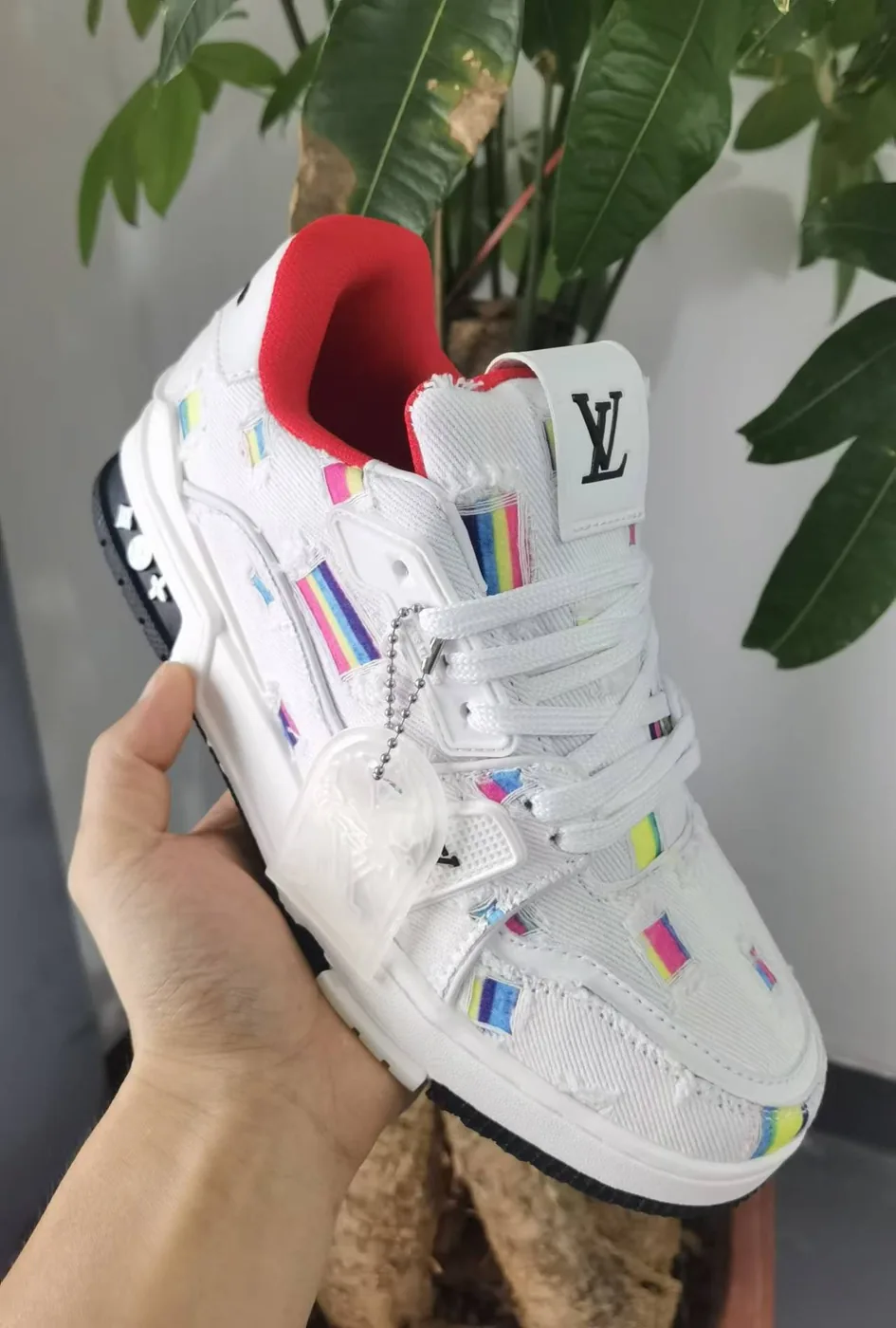 Louis Vuitton LV Trainer Sneaker – Frayed Denim — supplied photograph 1