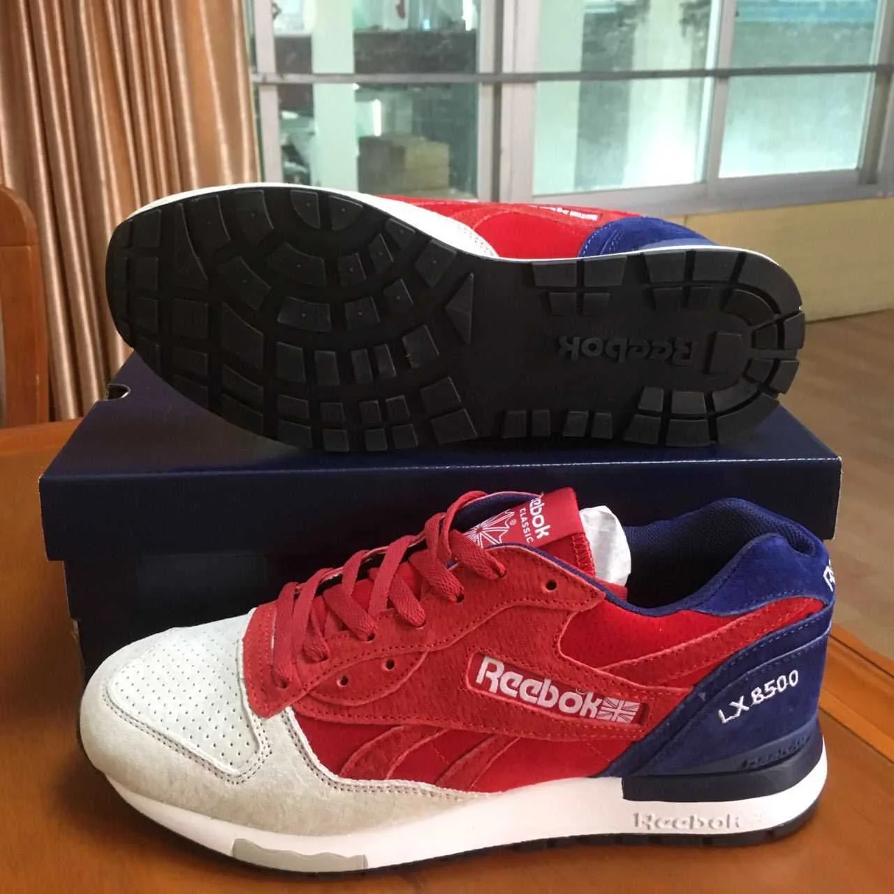 Reebok LX8500 — White / Red / Blue — supplied view