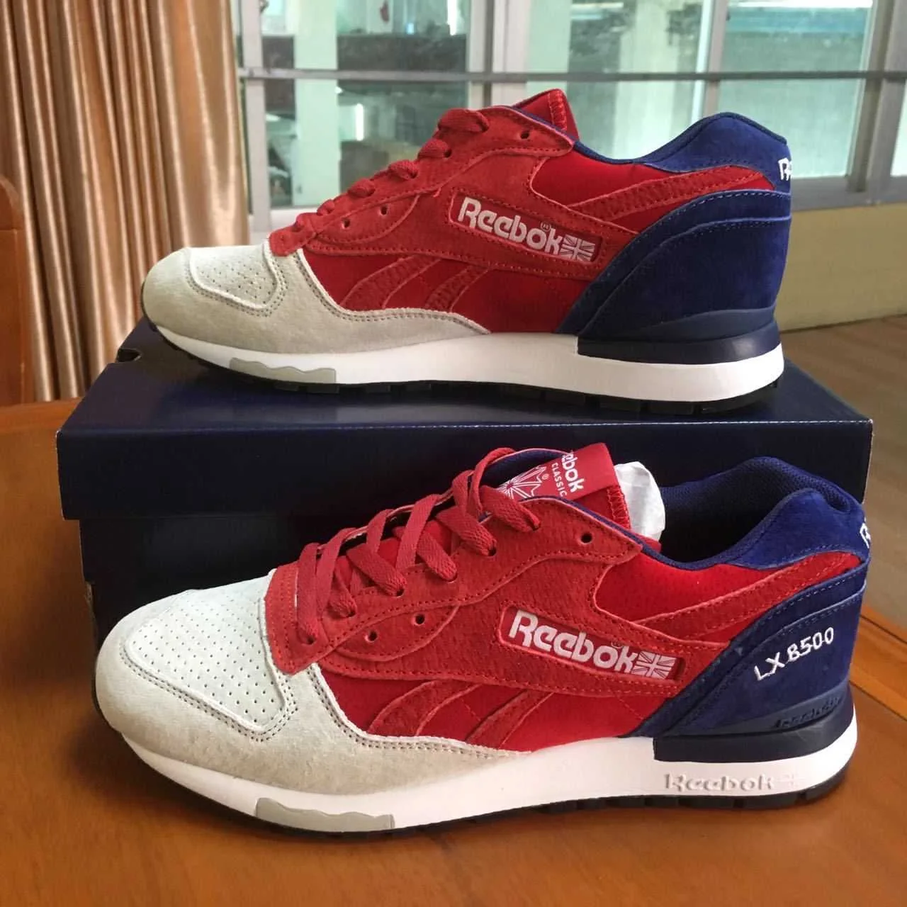Reebok LX8500 — White / Red / Blue — supplied view