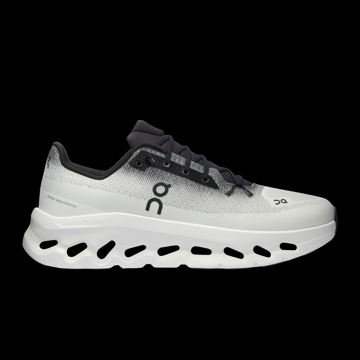 On Cloudtilt — black / ivory — lateral view (official reference photograph)