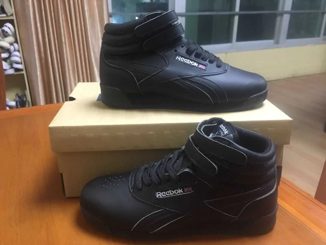 Reebok Freestyle Hi — Black — supplied view